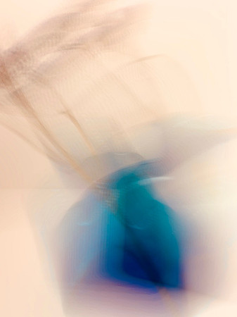 Abstract mixed media artwork featuring a blue square form against a warm orange-toned background.